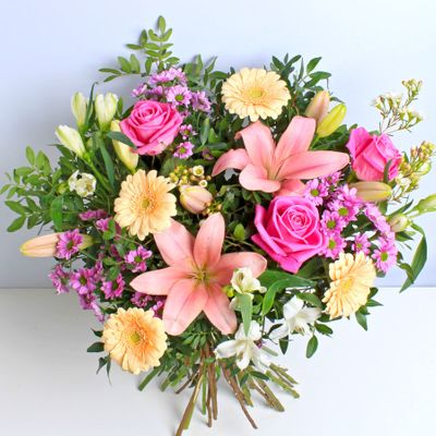 Show mum some love with the finest pink roses! This luxurious Mother's Day bouquet is hand tied to include thistle, roses, and delicate bear grass . The very best flowers, for the very best mum. *Vase not included. 
Edited